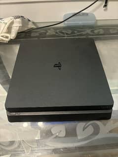 Ps4 slim with box and all accessories and 1 Game and 1 controller