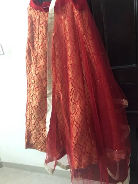 red bridal wear and golden maxi for 6000 2