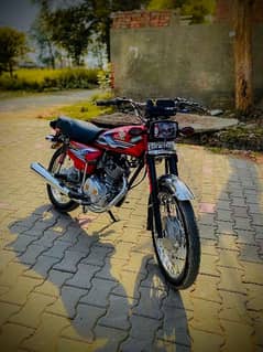 Honda 125 All ok 10/10 good condition 2 silancer black and crown