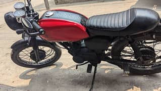 Honda 125 Cafe Racer read ad