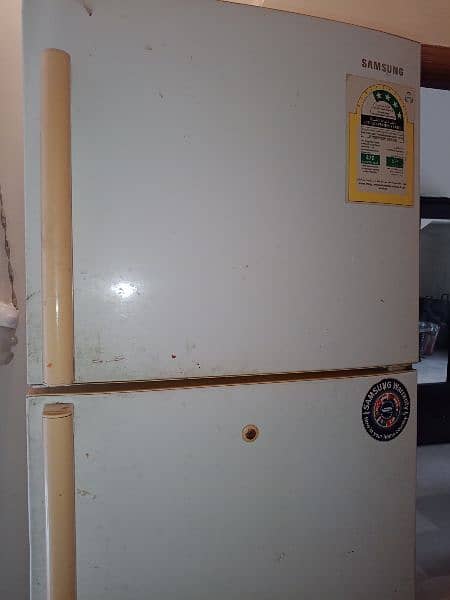 Samsung fridge no frost is for sale no issue very less in price 3