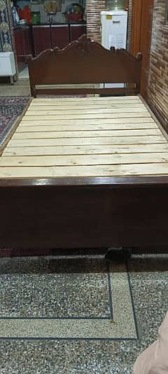 wooden singel bed