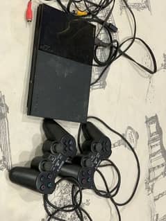 PlayStation 2 With 2 controllers and 8Mb card