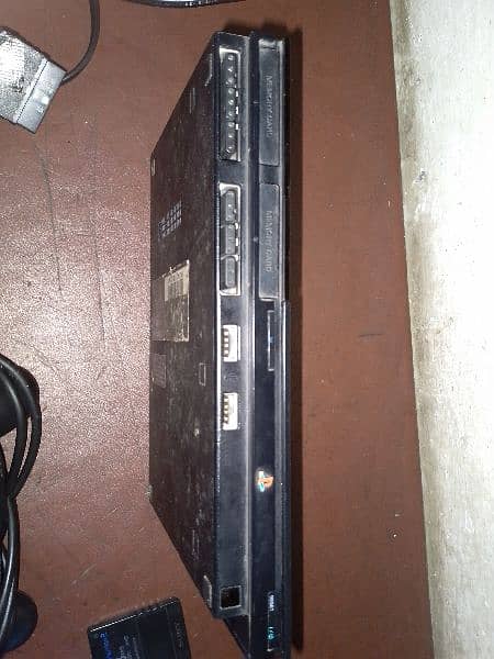 PS2 console+AV cable+ power cable+2 controller 7