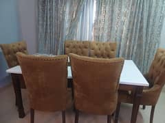 almost new dinning table with chairs