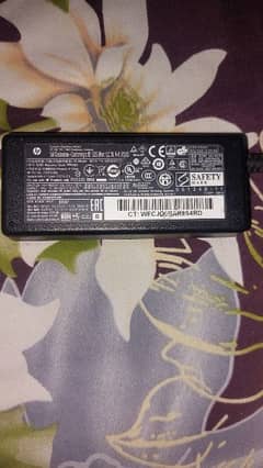 HP ORIGINAL 65W CHARGER