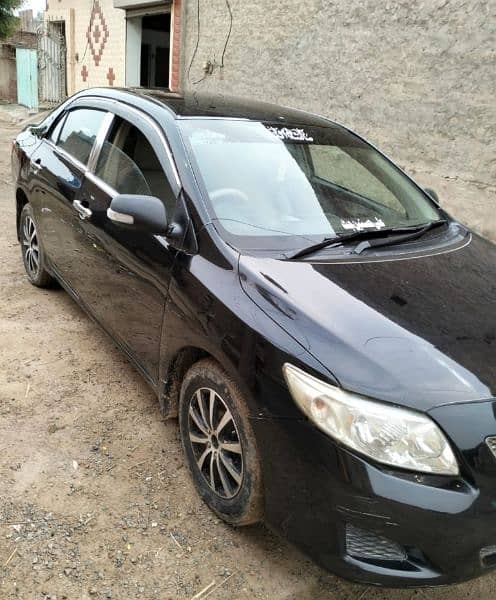 Toyota Corolla XLI 2009.  (03086693800) 1