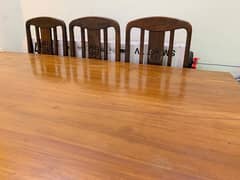 Wooden dining table with 6 wooden chairs for sale in Good condition.