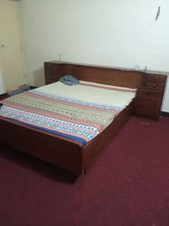 solid wooden queen bed