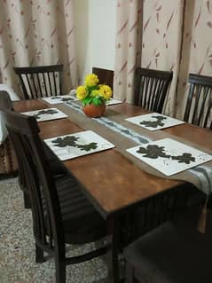 six seater wooden dinning table