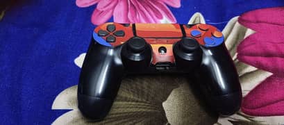 PS4 controller with superman sticker edition