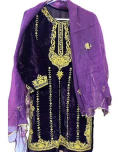 Amethyst velvet shirt and silky bottom embellished with dabka work.