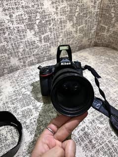 Nikon D610 with Nikon 120 mm lens and extra battery