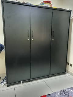 black three door cubbaord wardroab