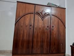 King size bed ,3 door cupboard, Dressing table and side board.