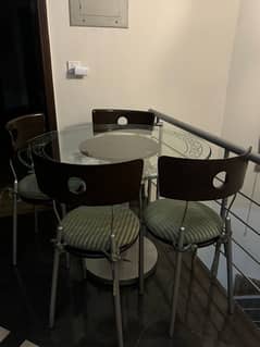 Glass top dining table with 4 chairs