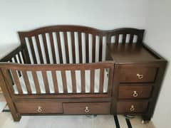 Wooden baby crib