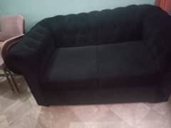 black valvat sofa
