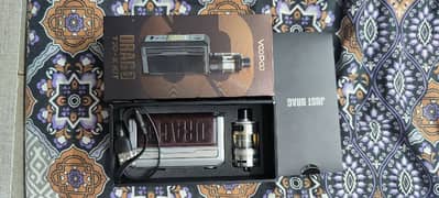 Drag 3 vape with 100ml pop flavr, 177 watt, with complete accessories.