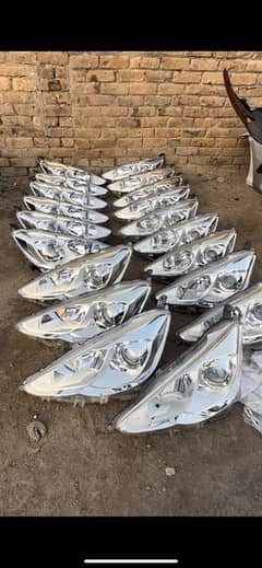 Aqua 2015 headlights