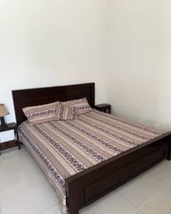 Wooden bed for sale - without side tables