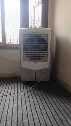 Room coolers . . like new . . used 2 months only