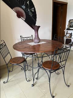 Wrought iron dining table with solid wood top!