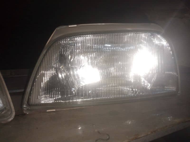 japnese alto 98/ charade head lights 1