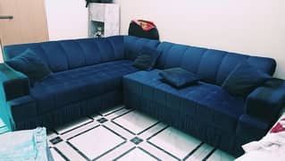 L shape sofa in blue color available for sale. 0