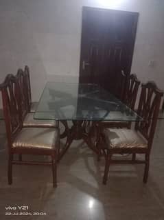 6 seater capacity with glass Table