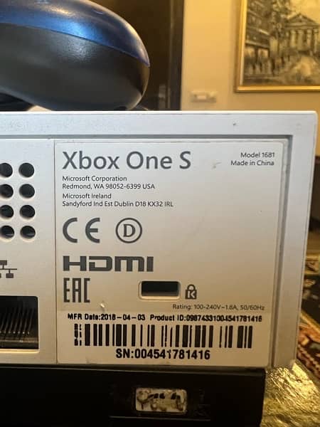 Xbox one s 500gb with original controller and a wired controller 2