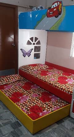 kids single beds 3 with 2 mattress. . with staduy table and 2 chairs