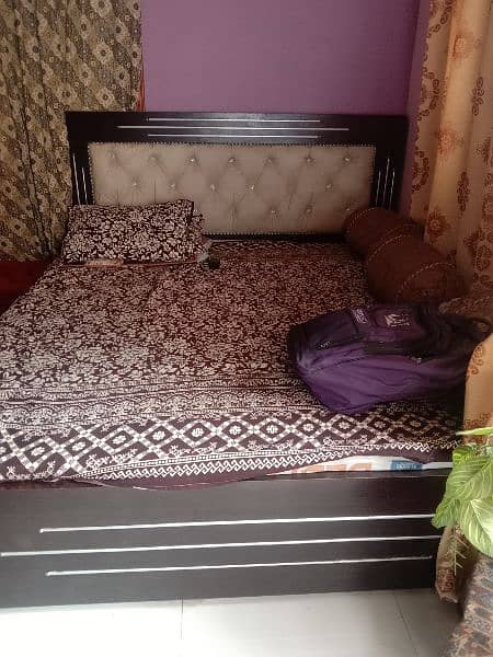 bed with mattress in good condition 0