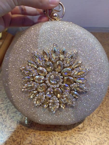 Bridal round golden clutch 0