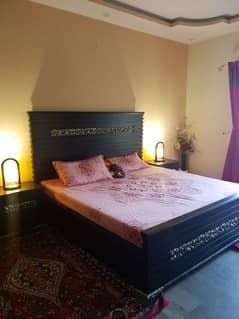 King size wooden double bed