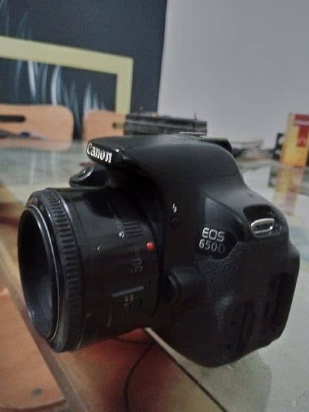 Canon 650d with 50 mm lence and flash gun 1