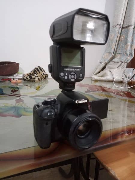 Canon 650d with 50 mm lence and flash gun 3