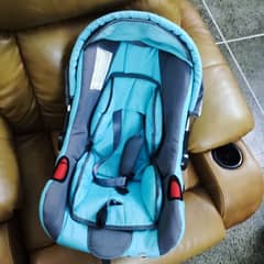 baby cot and car seat