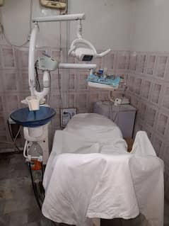 DENTAL CHAIR WITH INSTRUMENTS AND COMPRESSOR