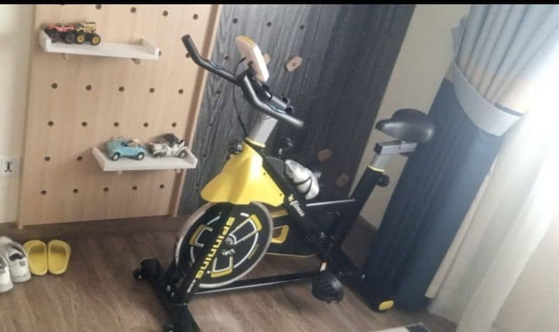 SPINNING BIKE BRAND NEW WITH 6 MONTHS WARRANTEE 0*3*3*3*7*1*1*9*5*3*1 1