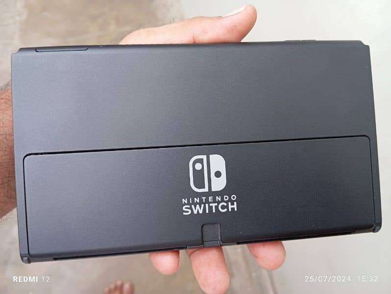 sell my Nintendo switch OLED with 256gb+64gb full game load 9