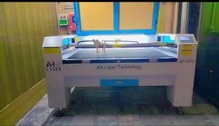 Laser cutting and engraving machine