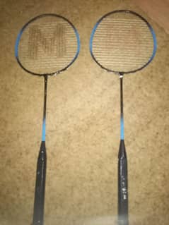 Badminton pair with out shitlecook