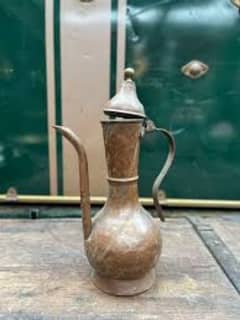 antique cooper pitcher 250 year old.