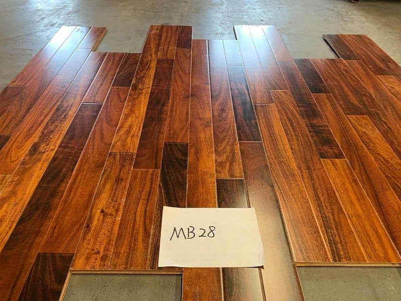 Laminate Wooden Floors Gloss finish/ Pvc Wall skirting/ carpet tiles. 3