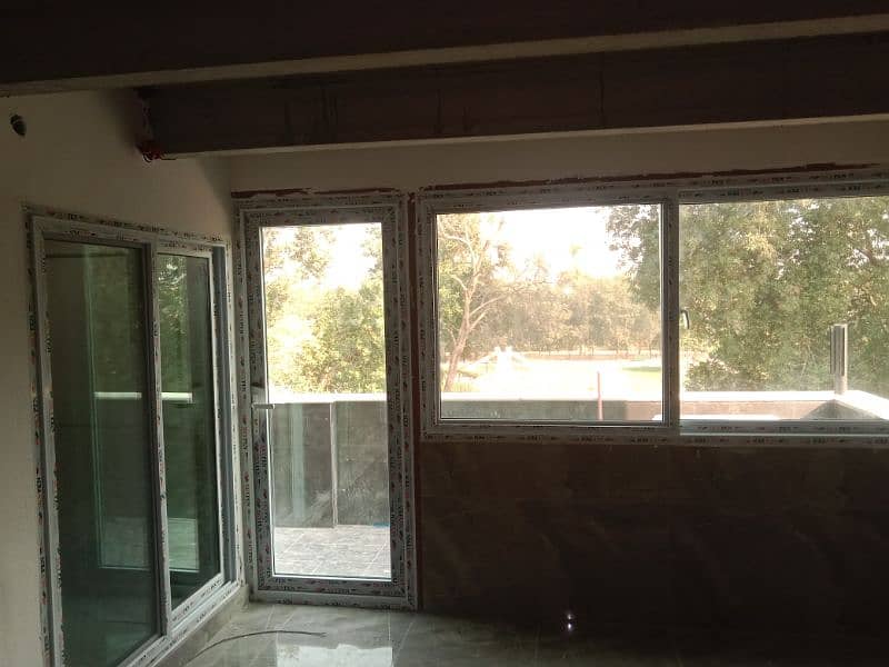 uPVC bathroom door and siladng windows 2