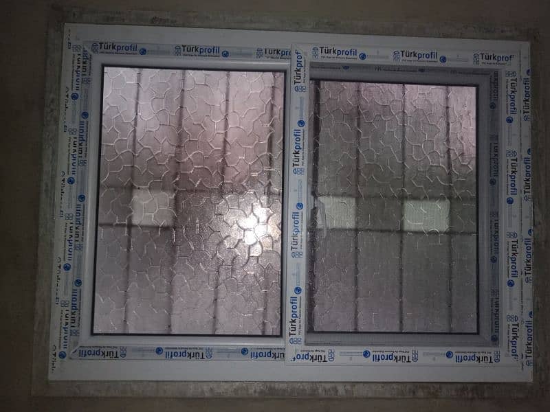 uPVC bathroom door and siladng windows 10