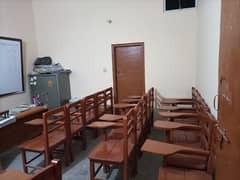 chairs, white boards, dice and table