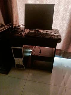Computer with keyboard and table