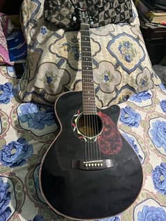 semi acoustic guitar new strings and with capo and bag.